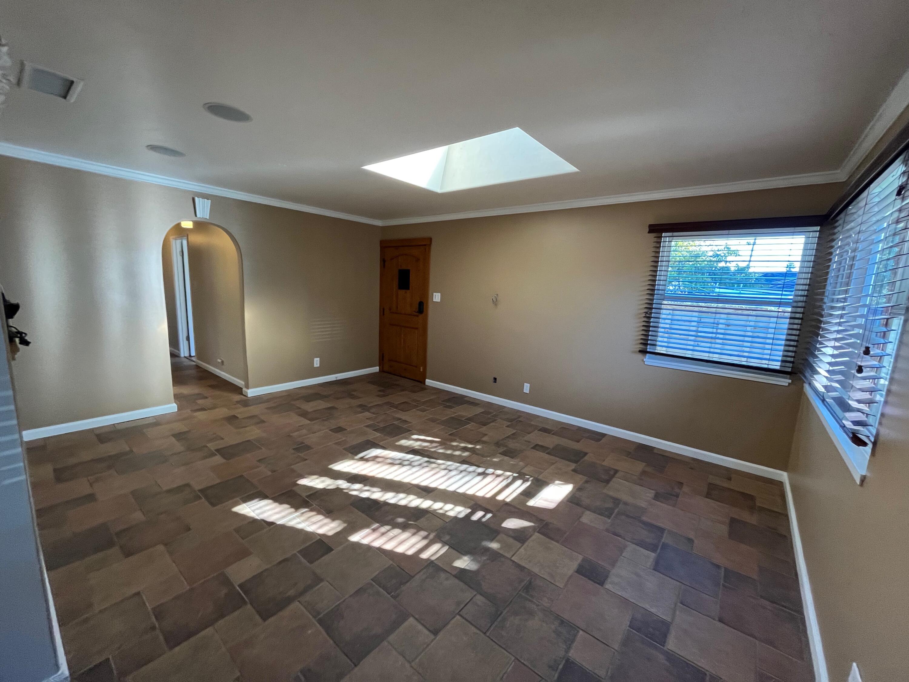 7020 Del Norte Drive Goleta, CA 93117 - Photo 5 of 23 a view of a big room with windows and chandelier fan