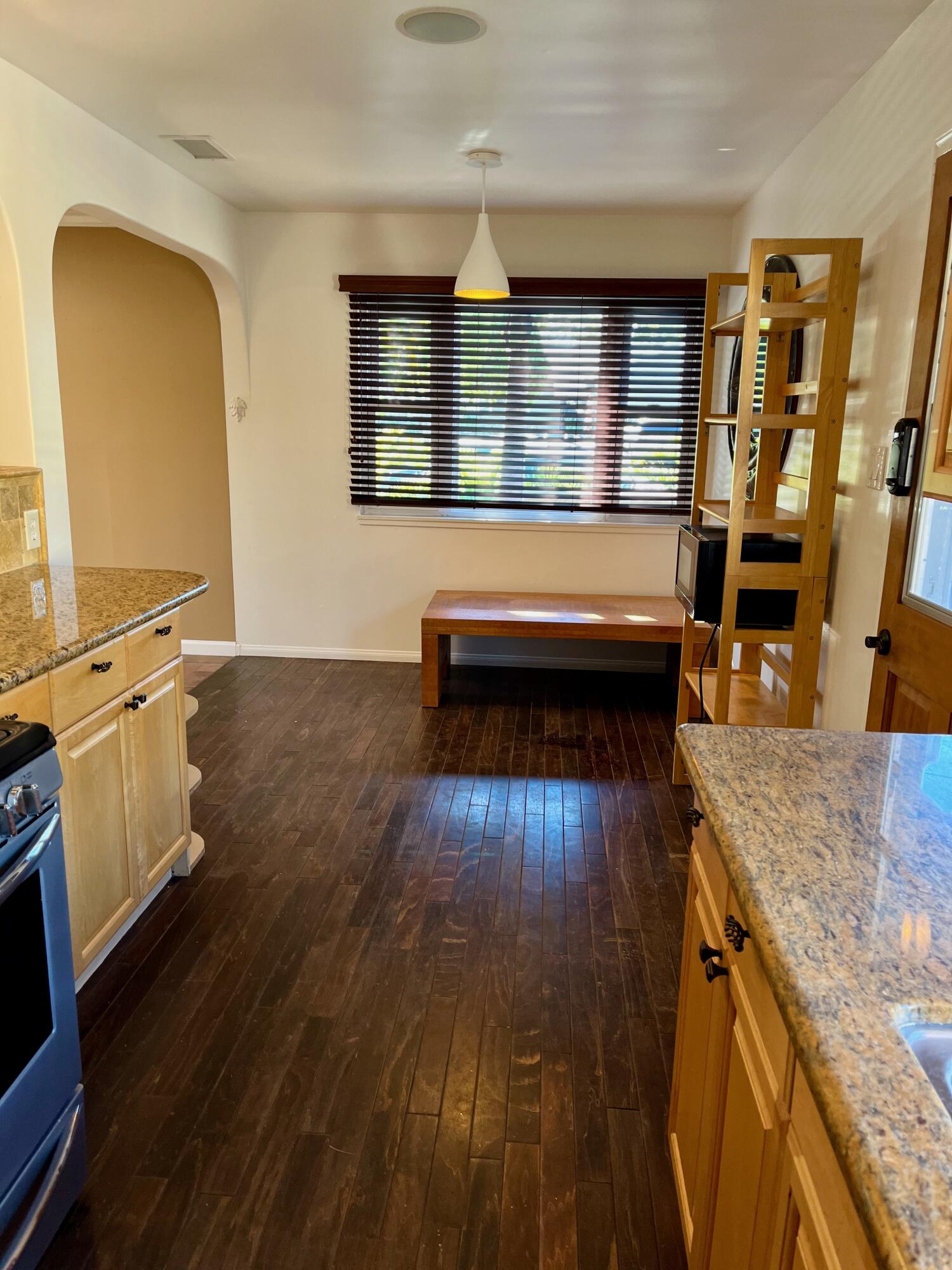7020 Del Norte Drive Goleta, CA 93117 - Photo 7 of 23 a view of a kitchen with wooden floor and a sink