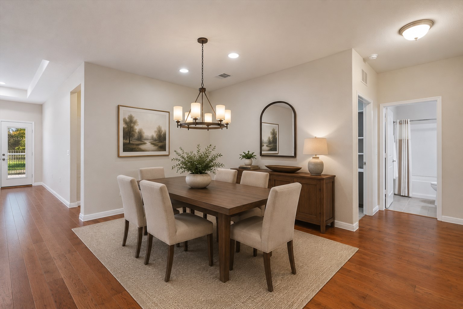 104 Coffee Mill Creek Road Georgetown, TX 78633 - Photo 13 of 40 Hardwood floors and recessed lighting grace this elegant dining room, perfect for entertaining.