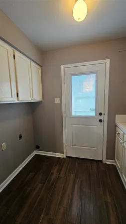 a view of room with hardwood floor