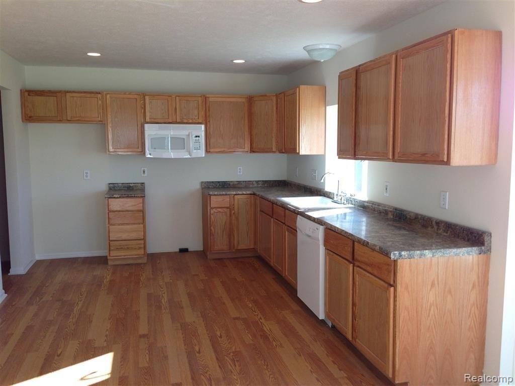 6876 West Hayner Road Fowlerville, MI 48836 - Photo 4 of 24 Photo Jun 03, 8 30 21 AM (Medium