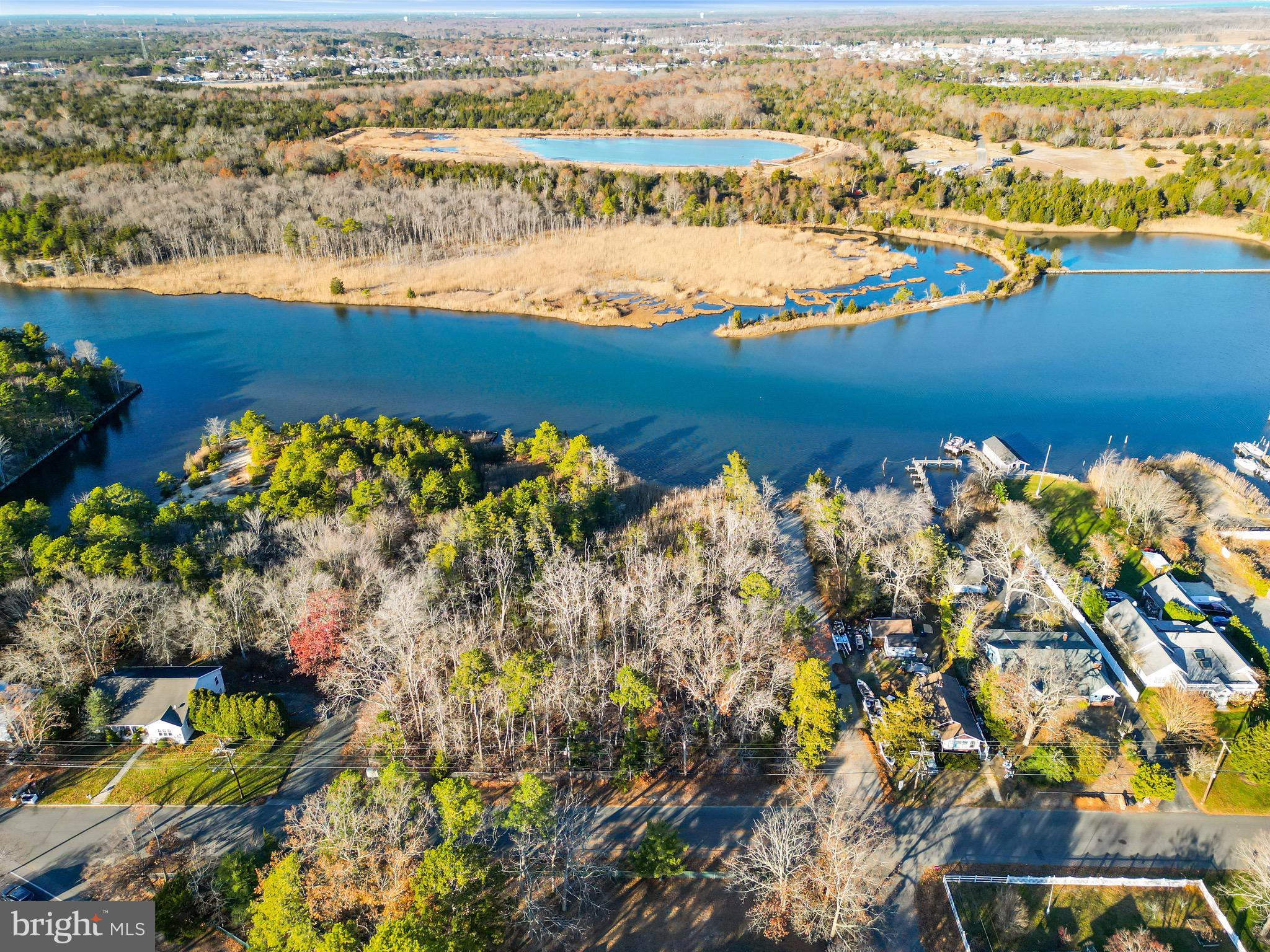 3 Dock Avenue Waretown, NJ 08758 - Photo 3 of 19 an aerial view of beach and residential houses with outdoor space