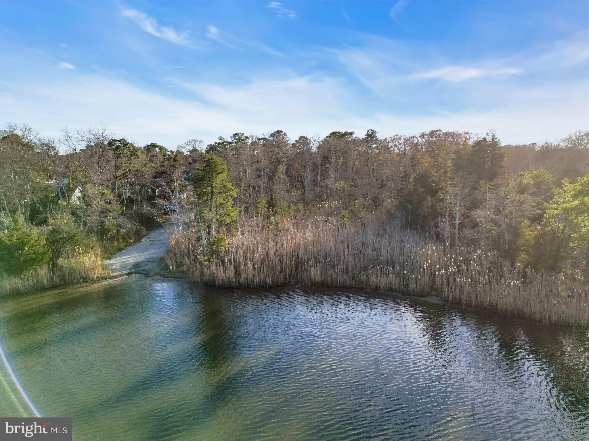 3 Dock Avenue Waretown, NJ 08758 - Photo 8 of 19 a view of a lake with mountain