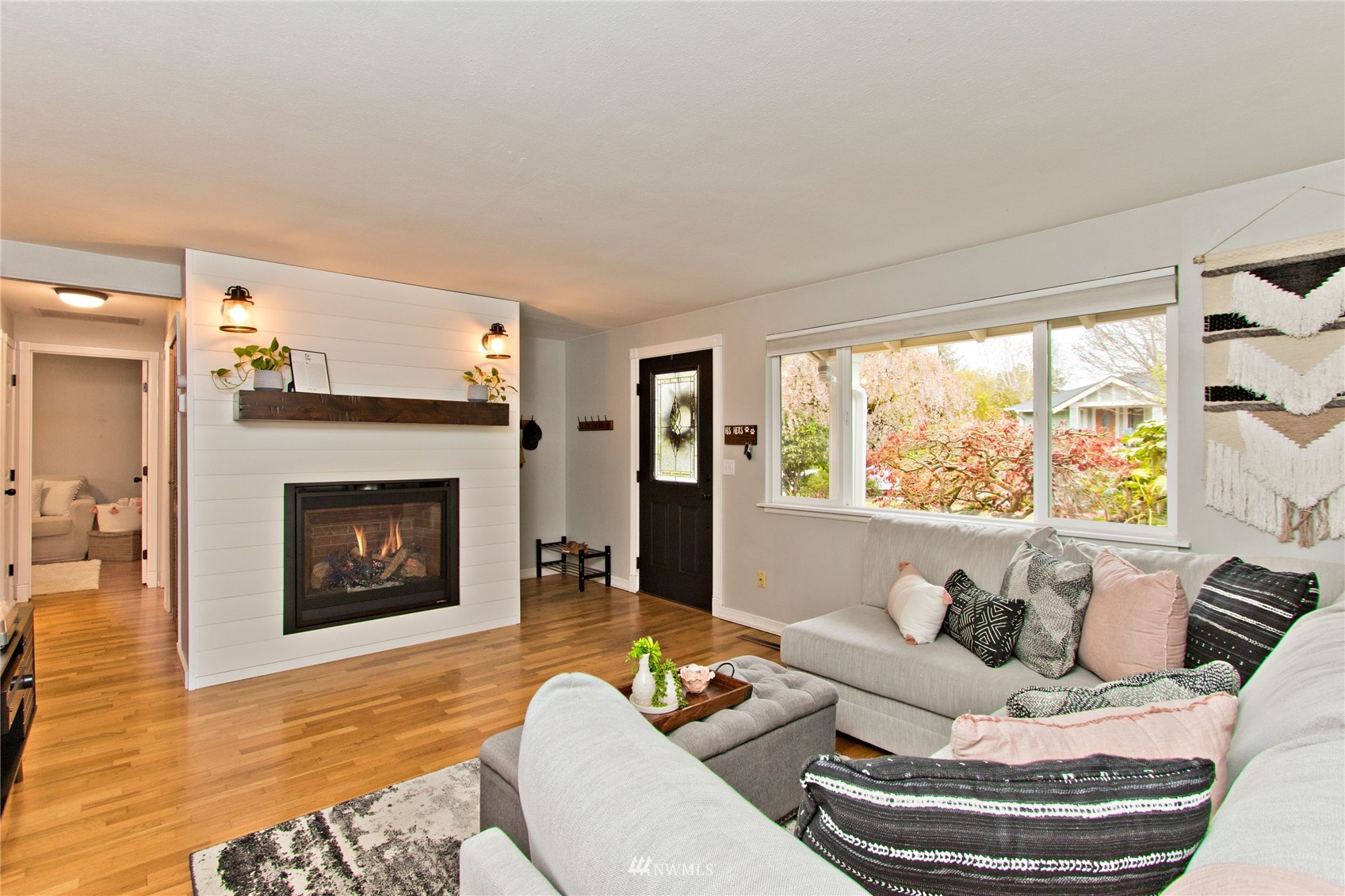 4215 Southeast 3rd Street Renton, WA 98059 - Photo 3 of 30 a living room with furniture and a fireplace