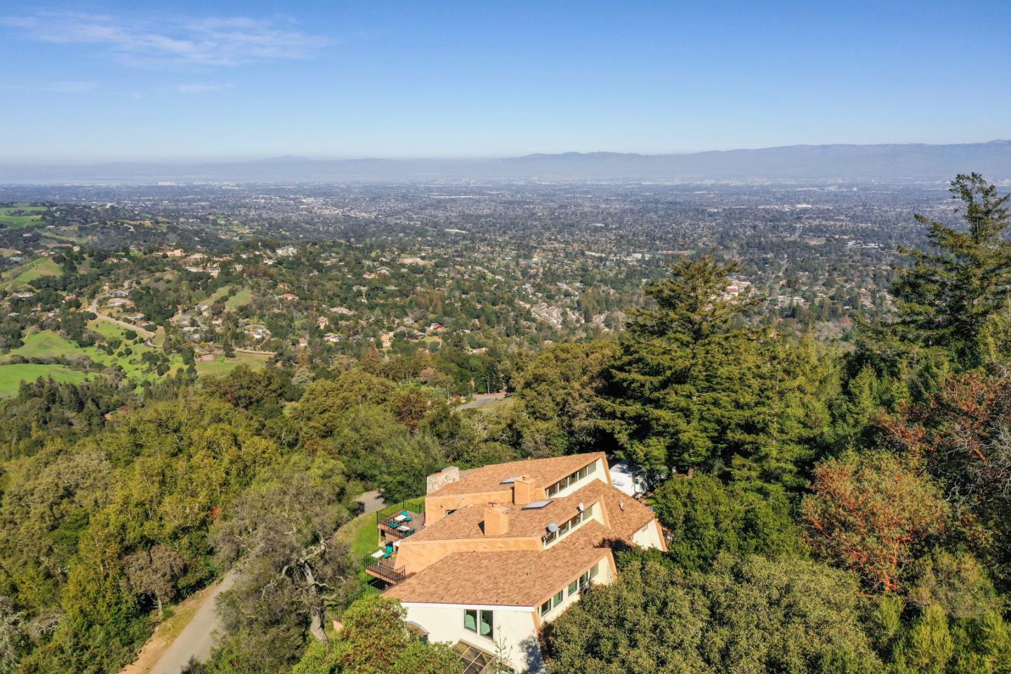 15525 Bohlman Road Saratoga, CA 95070 - Photo 1 of 8 an aerial view of residential house with outdoor space