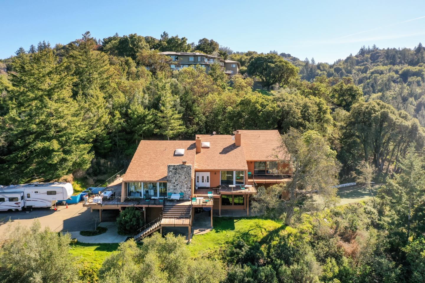15525 Bohlman Road Saratoga, CA 95070 - Photo 3 of 8 an aerial view of a house with swimming pool patio and lake view