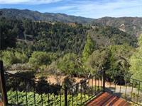 15525 Bohlman Road Saratoga, CA 95070 - Photo 6 of 8 a view of a city with lush green forest