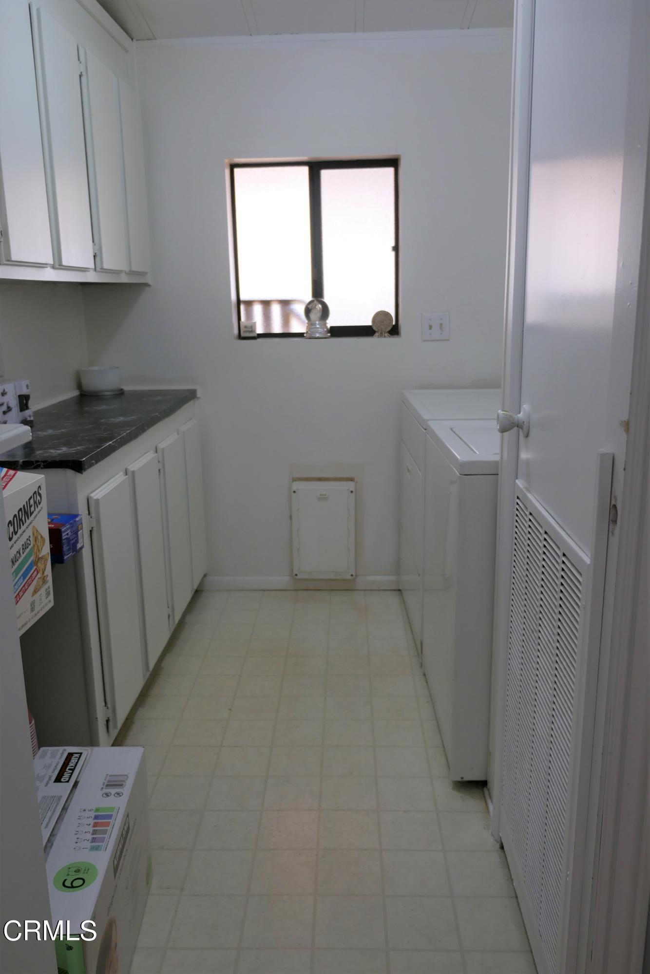 481 Raspberry Place, Unit 112 Oxnard, CA 93036 - Photo 14 of 18 a bathroom with a sink a toilet and window