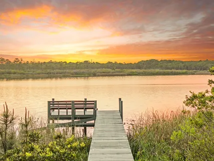 a view of a lake with a garden