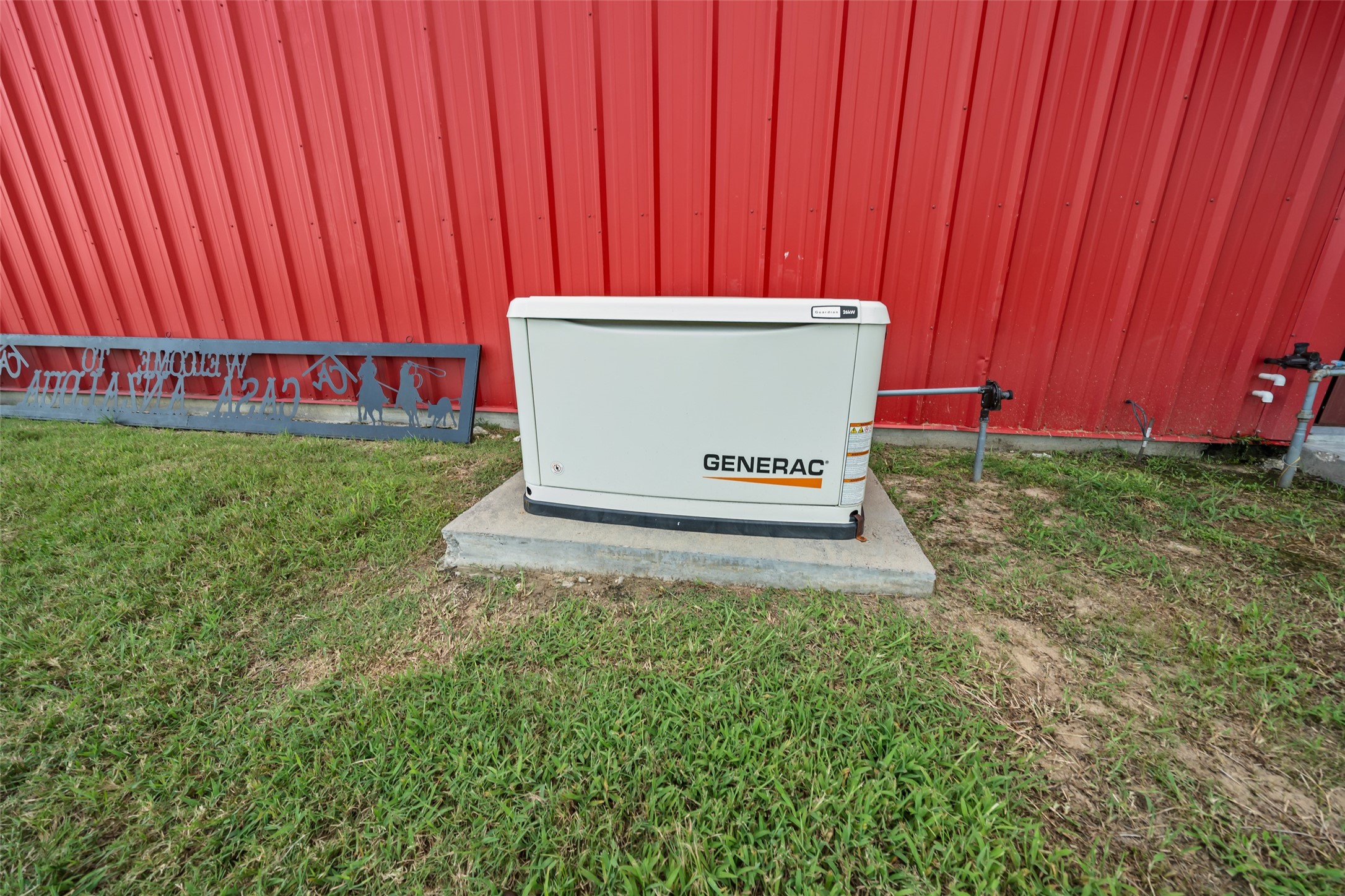 1402 Eagle Ferry Road Anahuac, TX 77514 - Photo 43 of 48 26kW whole-property Generac system ensures uninterrupted power to the home, barn, and arena.