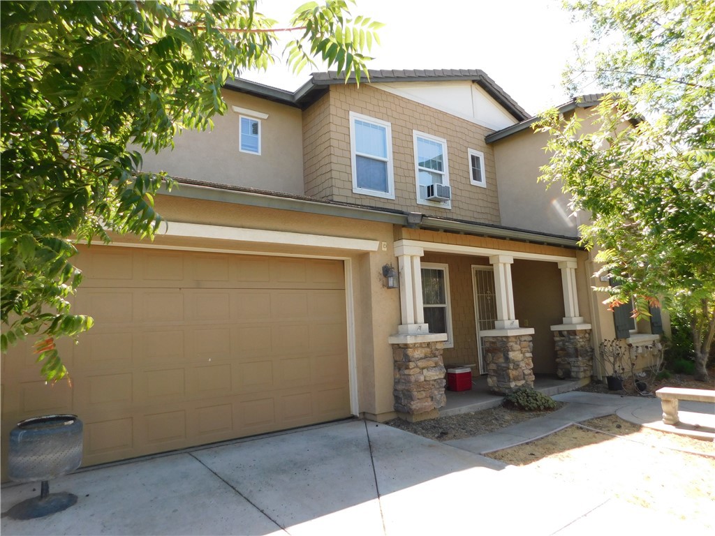 1216 Aups Court Merced, CA 95348 - Photo 27 of 45 a view of a house with a backyard