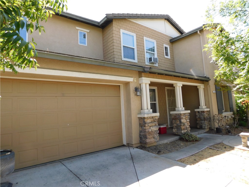 1216 Aups Court Merced, CA 95348 - Photo 3 of 45 a front view of a house with yard