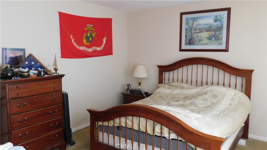 1216 Aups Court Merced, CA 95348 - Photo 44 of 45 a bedroom with a bed and a dresser in it