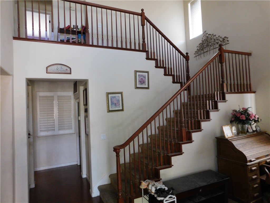 1216 Aups Court Merced, CA 95348 - Photo 6 of 45 a view of entryway and hall with wooden floor