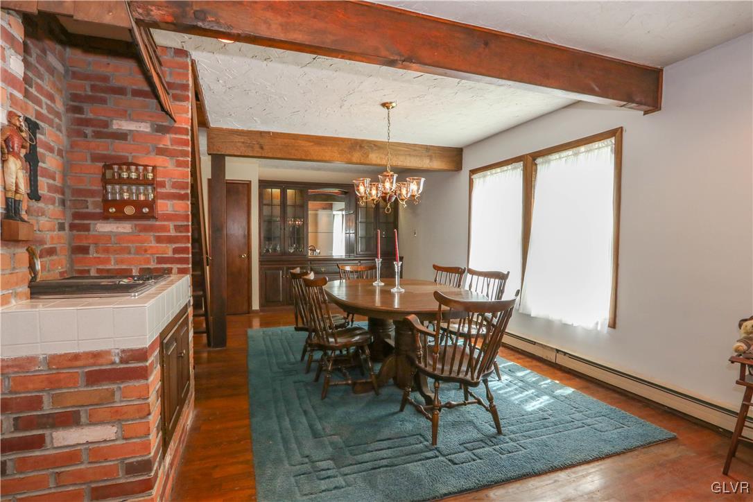 1271 Kilmer Road Tobyhanna, PA 18466 - Photo 12 of 36 a view of a dining room with furniture window and wooden floor