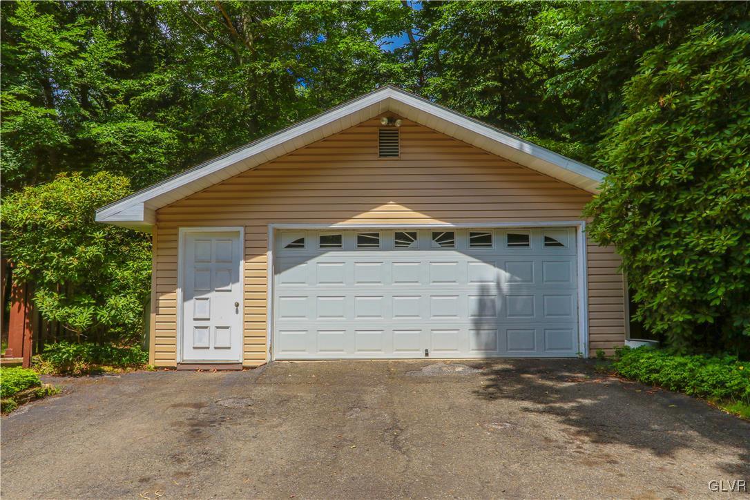 1271 Kilmer Road Tobyhanna, PA 18466 - Photo 31 of 36 a front view of a house with a garage