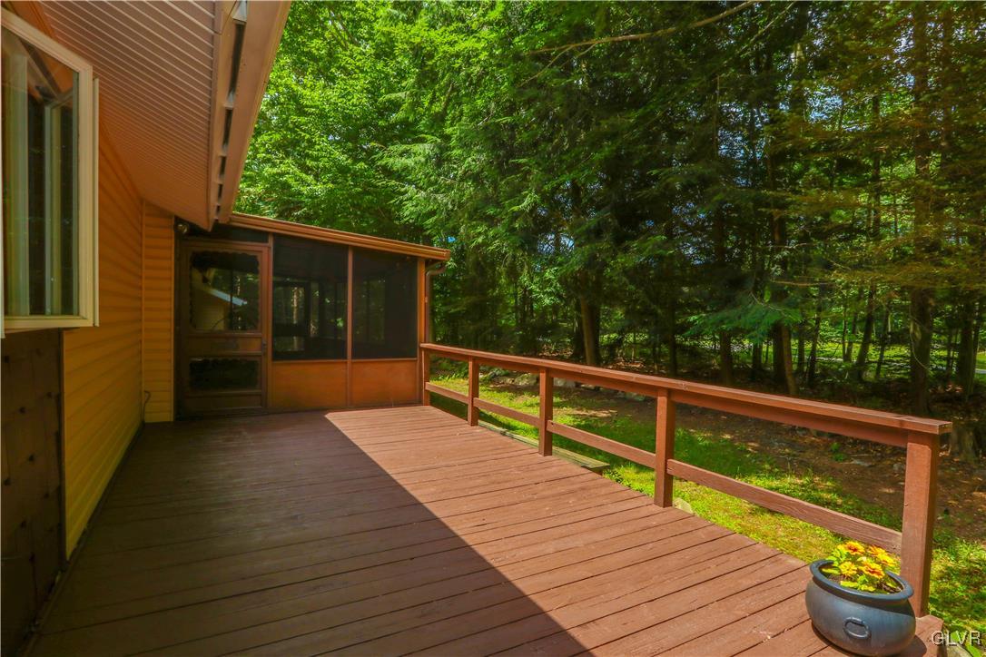 1271 Kilmer Road Tobyhanna, PA 18466 - Photo 4 of 36 a view of balcony with wooden floor and seating space