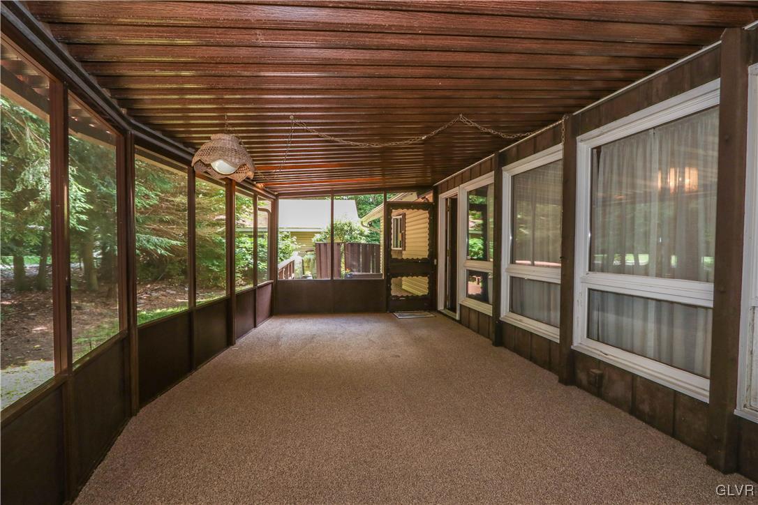1271 Kilmer Road Tobyhanna, PA 18466 - Photo 5 of 36 a view of a porch with wooden floor
