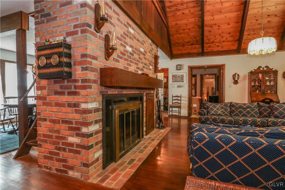1271 Kilmer Road Tobyhanna, PA 18466 - Photo 9 of 36 a view of a livingroom with furniture and staircase