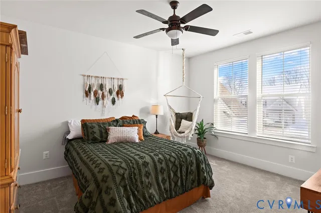 a bathroom with a sink toilet and a mirror