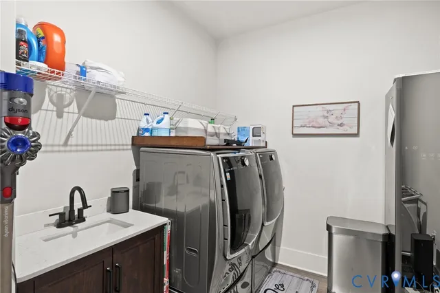 a view of a white house with a yard