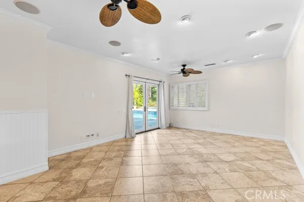 a view of an empty room and window