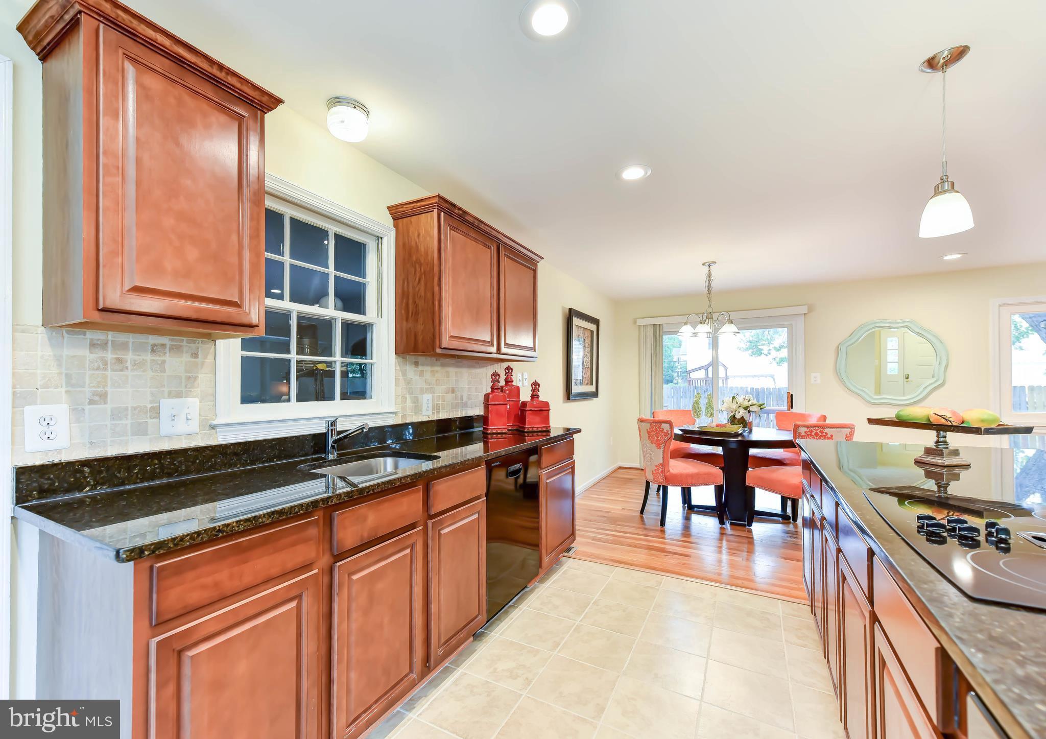 1936 Hull Road Vienna, VA 22182 - Photo 8 of 30 Kitchen w/granite countertops & tile floors