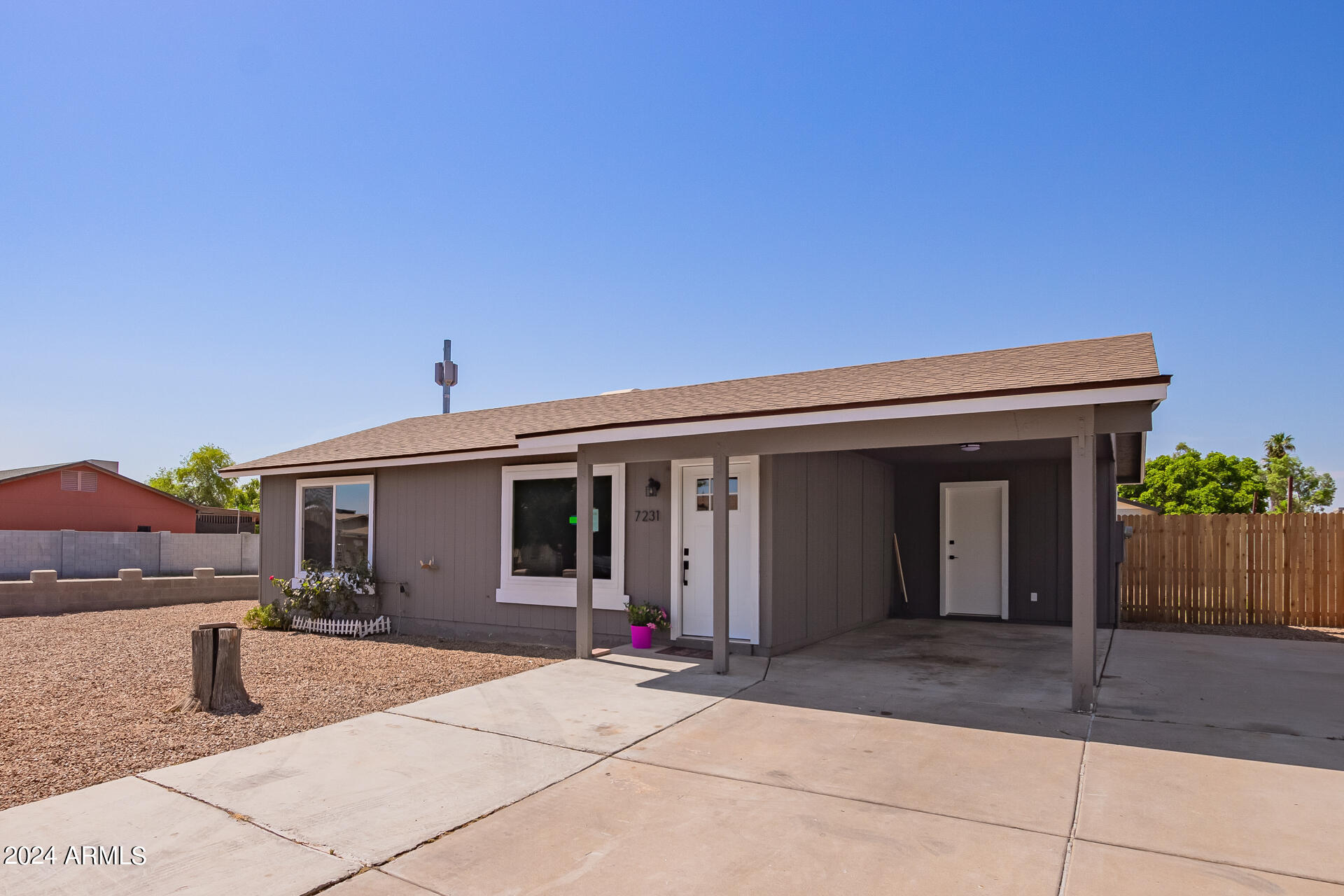 7231 West Flower Street Phoenix, AZ 85033 - Photo 3 of 22 a view of backyard of the house