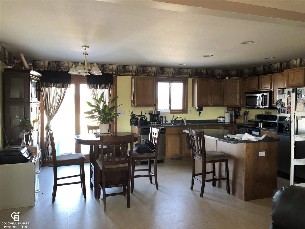 1103 East Galbraith Line Road Melvin, MI 48454 - Photo 2 of 43 View of kitchen from living room