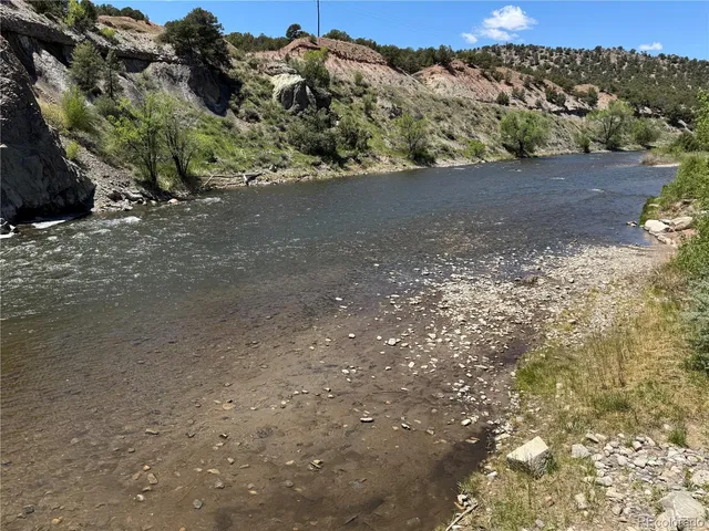 a view of a lake with mountains in the background