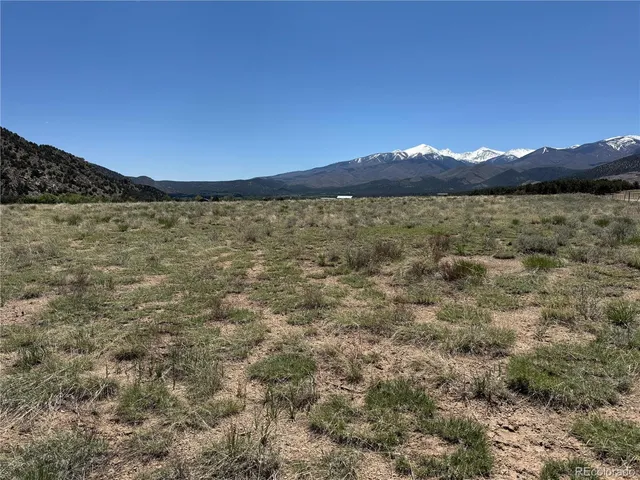 a view of lake and mountain
