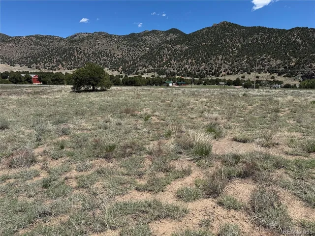 a view of mountain with sunset view