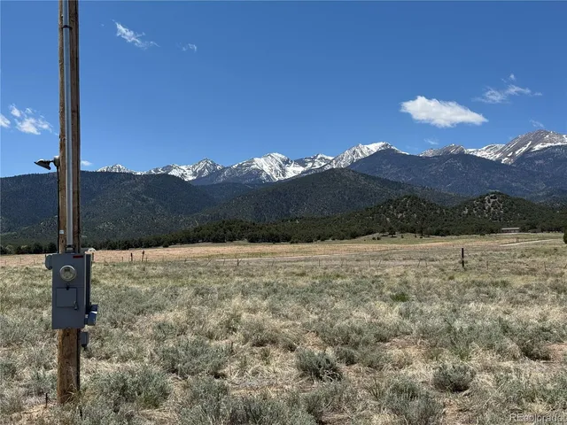 a view of a yard with mountain view