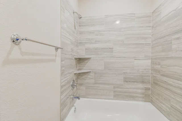 a bathroom with a bathtub