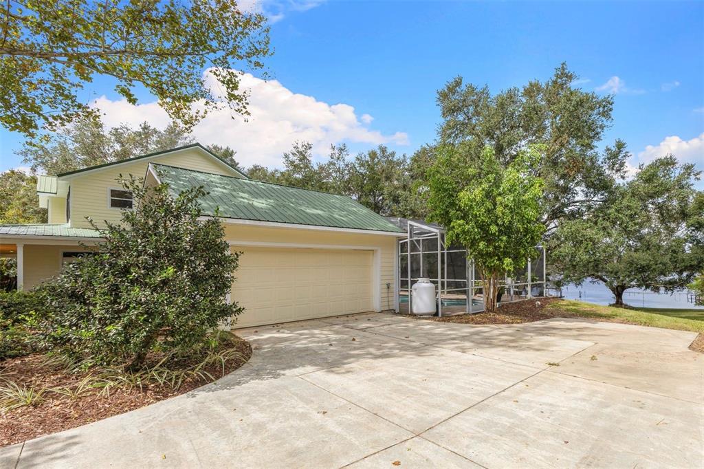 18725 South Obrien Road Groveland, FL 34736 - Photo 18 of 68 a front view of a house with a yard