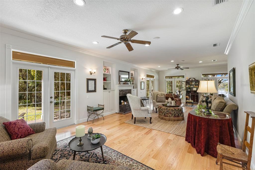 18725 South Obrien Road Groveland, FL 34736 - Photo 23 of 68 a living room with furniture and a large window
