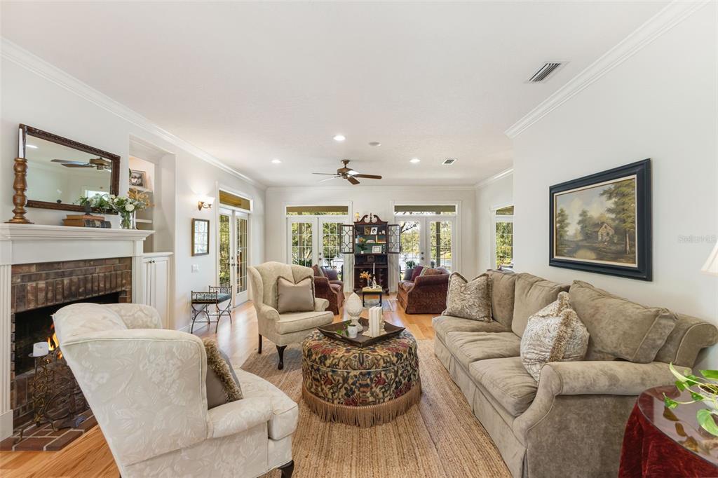 18725 South Obrien Road Groveland, FL 34736 - Photo 24 of 68 a living room with furniture and a fireplace