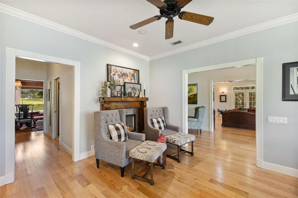 18725 South Obrien Road Groveland, FL 34736 - Photo 29 of 68 a living room with furniture and a wooden floor