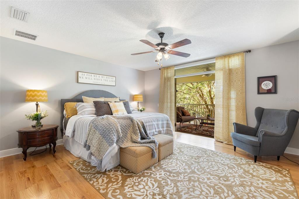 18725 South Obrien Road Groveland, FL 34736 - Photo 40 of 68 a bedroom with a bed and a couch