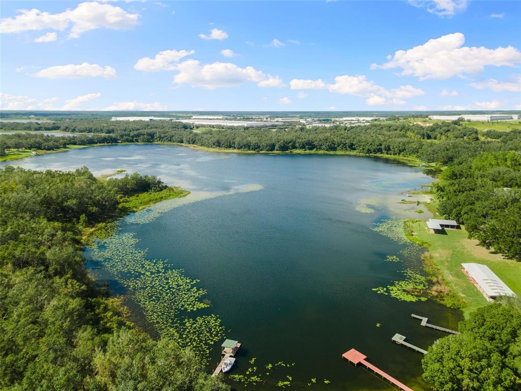 18725 South Obrien Road Groveland, FL 34736 - Photo 4 of 68 a view of a lake with a city