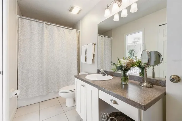 a view of outdoor space with deck and trees