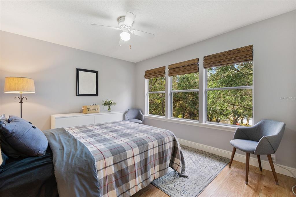 18725 South Obrien Road Groveland, FL 34736 - Photo 48 of 68 a bedroom with a bed and a window