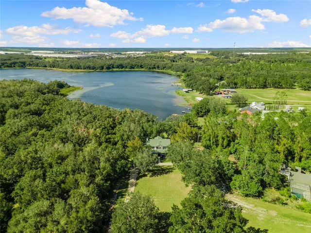 a view of a table and chairs in the garden