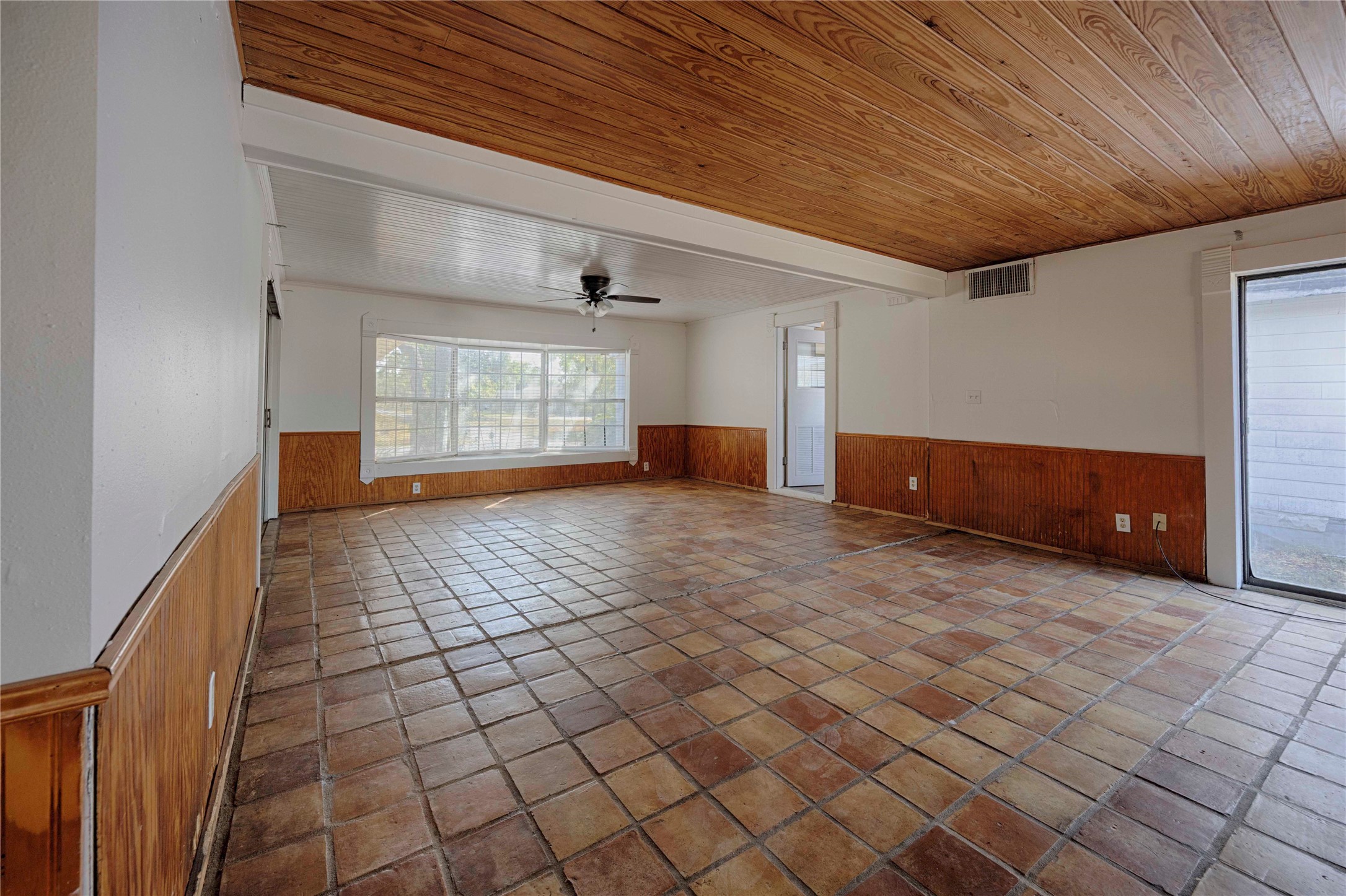 909 Eilers Street Schulenburg, TX 78956 - Photo 14 of 33 a view of empty room with wooden floor