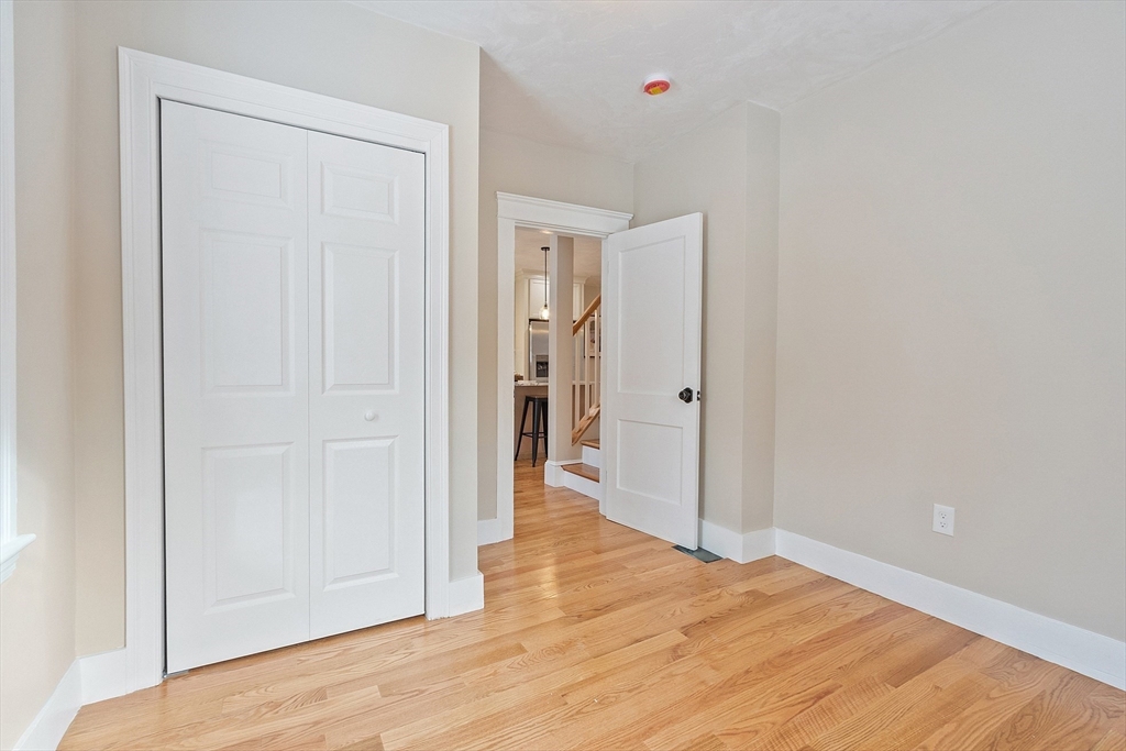42 North Worcester Avenue Worcester, MA 01606 - Photo 14 of 24 a view of a livingroom with wooden floor and closet