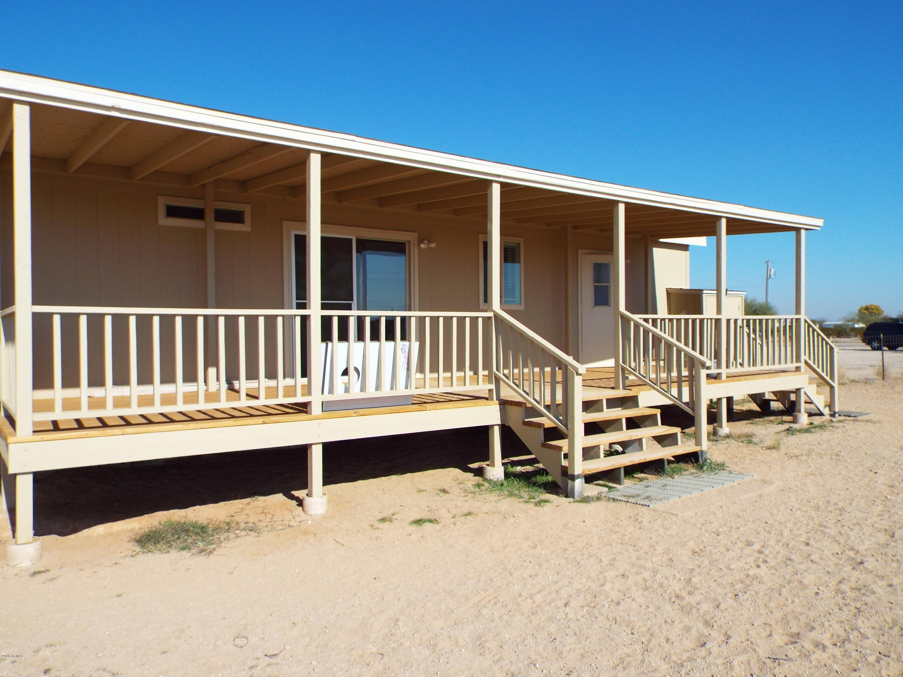 20843 West Teepee Road Buckeye, AZ 85326 - Photo 11 of 29 a view of porch with a bench