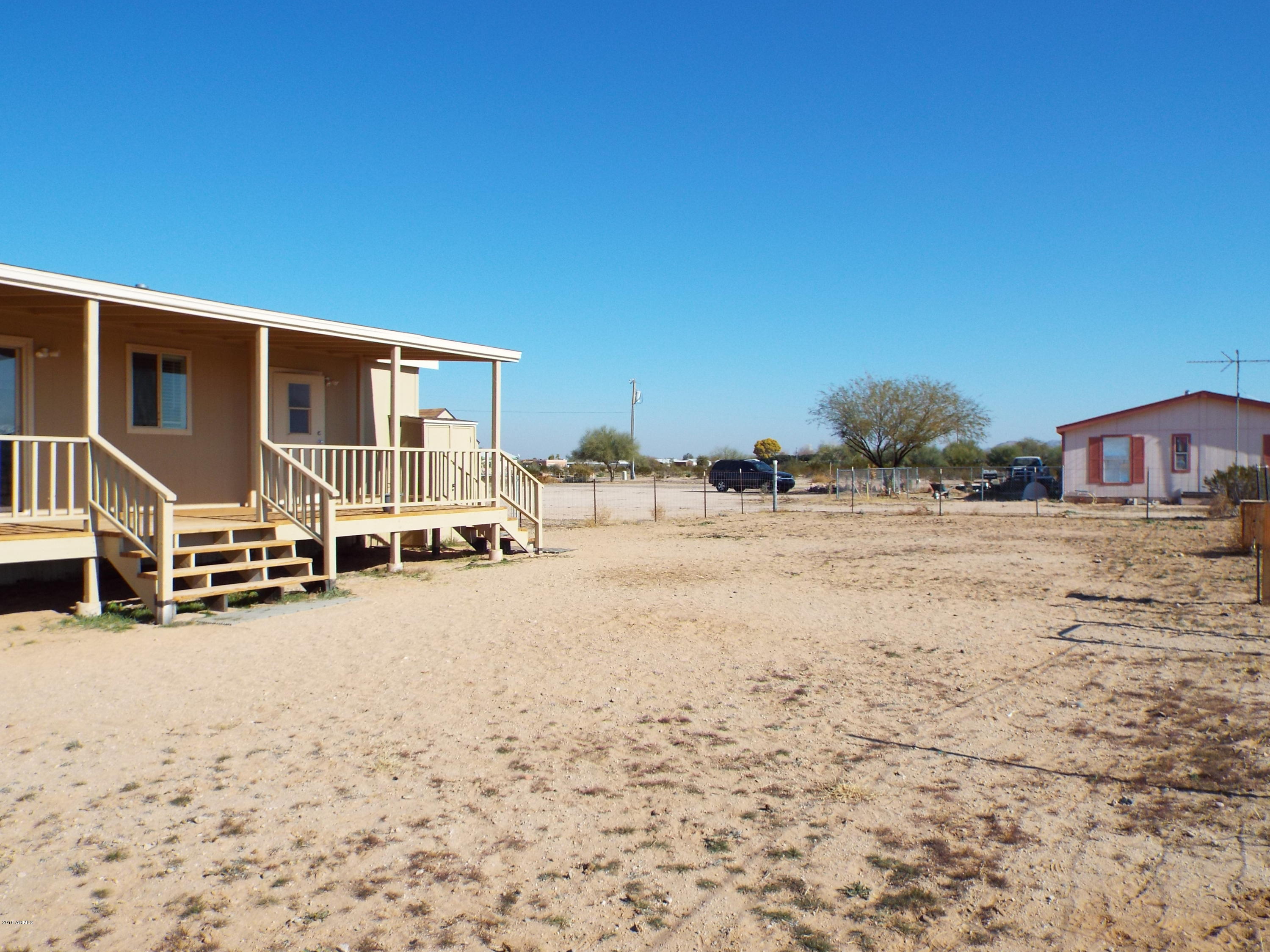 20843 West Teepee Road Buckeye, AZ 85326 - Photo 10 of 29 a view of a house with snow on the road