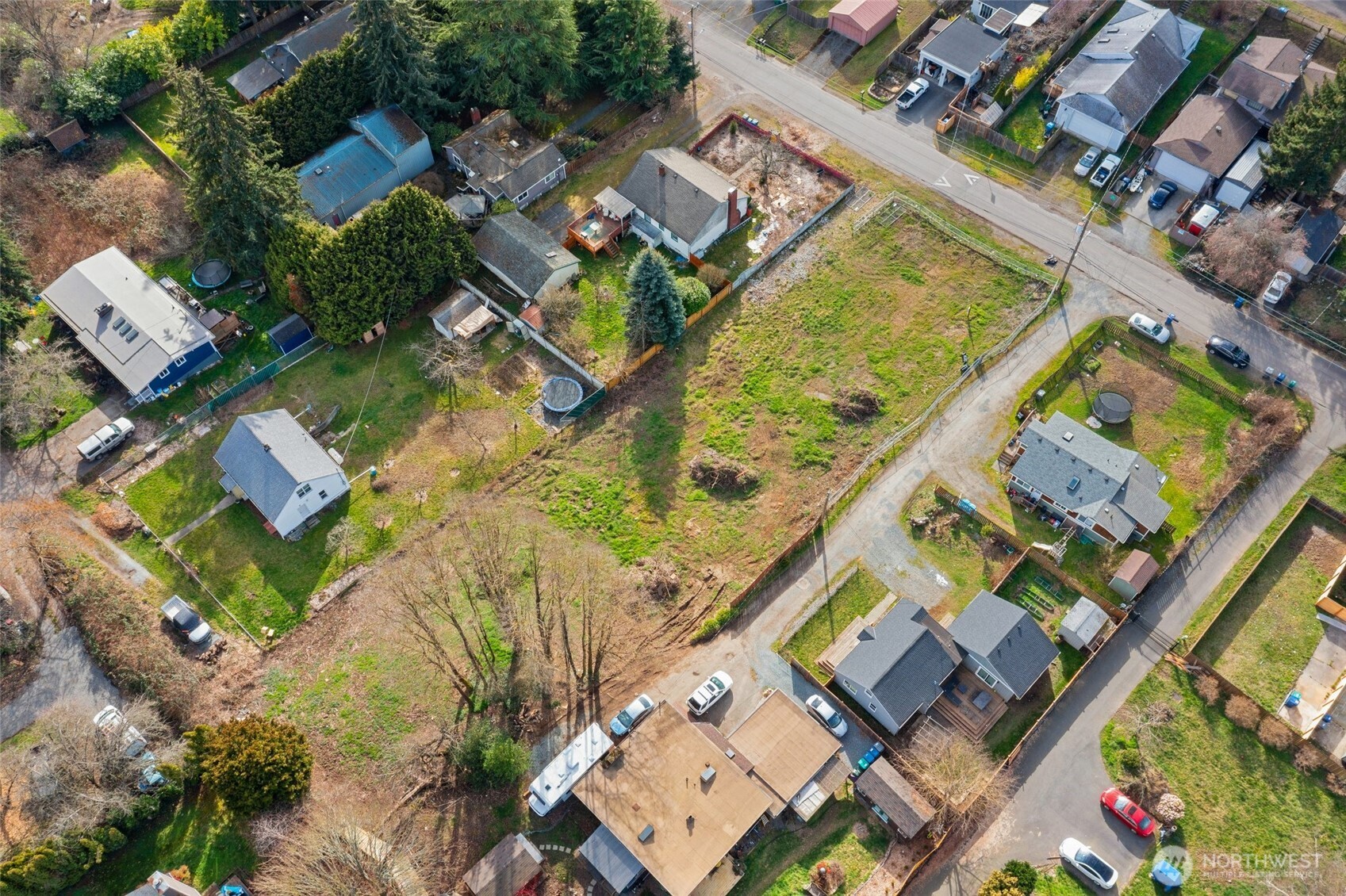 9806 30th Avenue Southwest Seattle, WA 98126 - Photo 2 of 15 an aerial view of a house with a garden