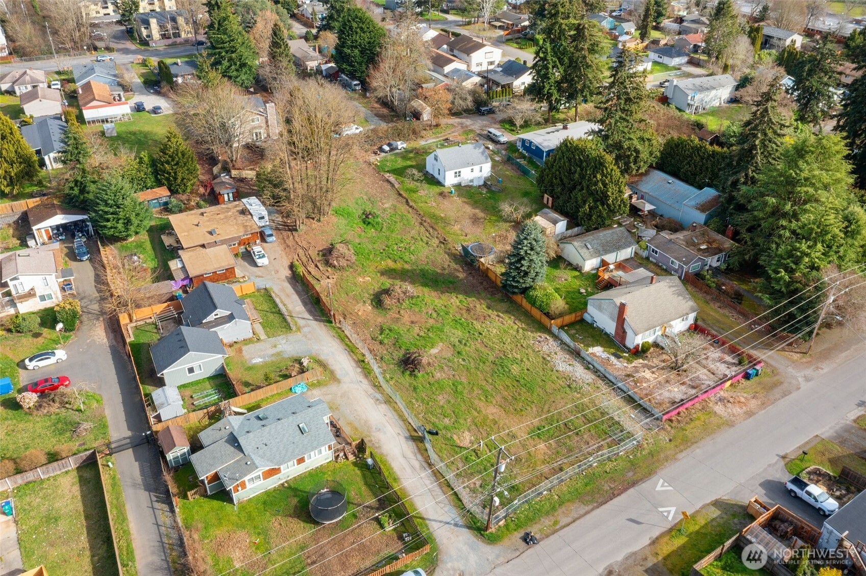 9806 30th Avenue Southwest Seattle, WA 98126 - Photo 5 of 15 an aerial view of residential houses with outdoor space