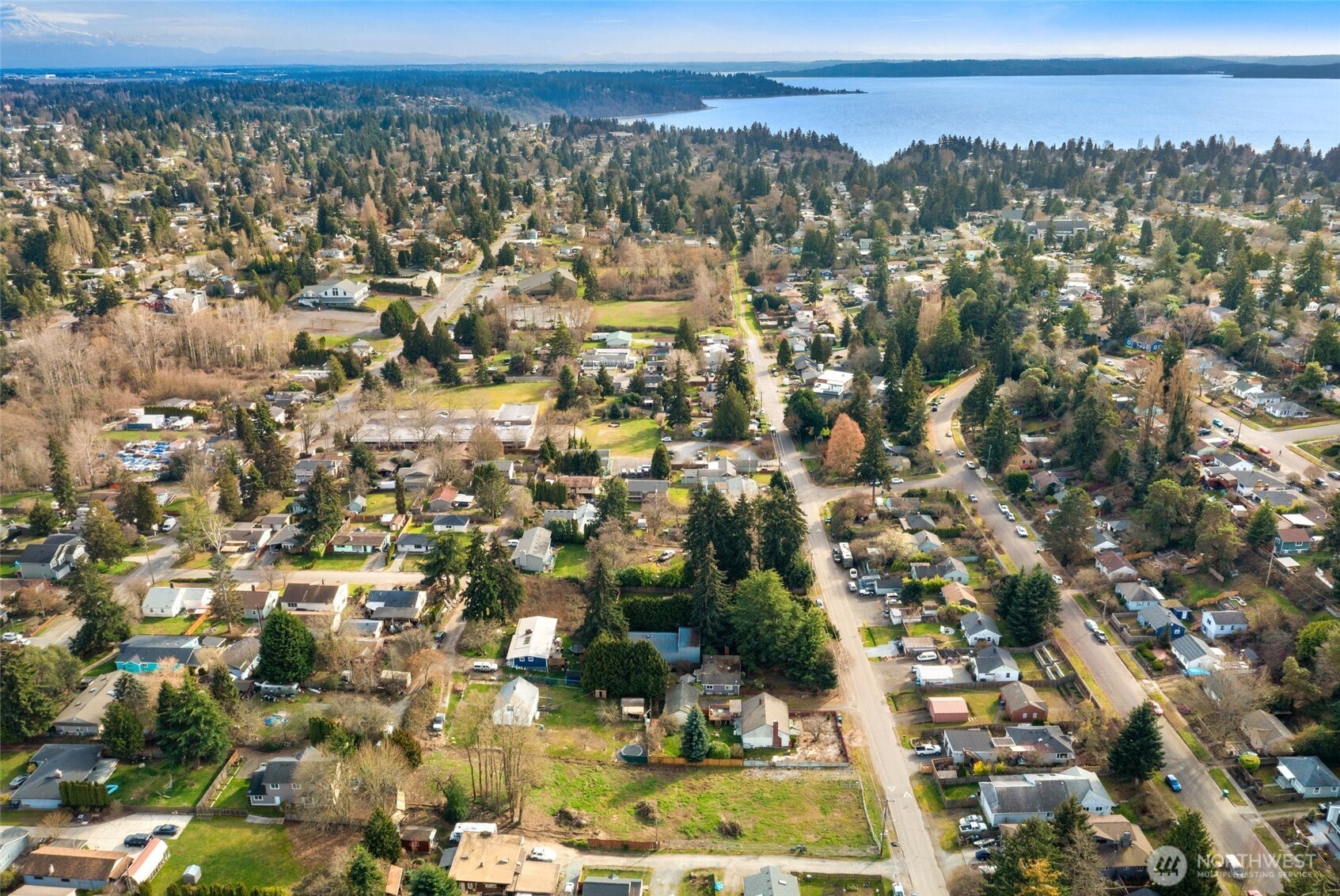 9806 30th Avenue Southwest Seattle, WA 98126 - Photo 10 of 15 an aerial view of residential building with trees